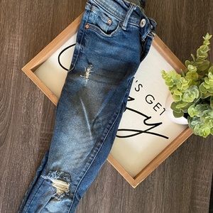 Skinny distressed jeans